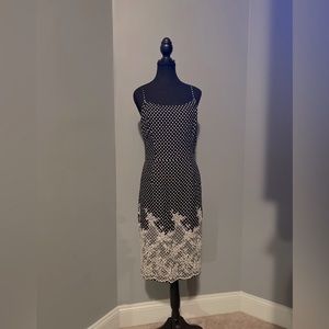 Eva Mendes spaghetti strapped polka dot and embroidered dress.